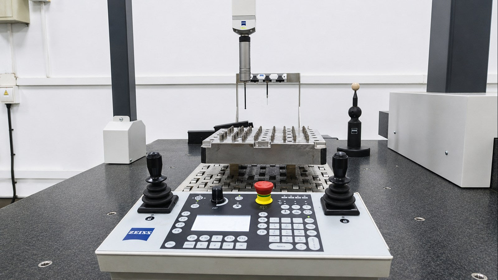 ZEISS coordinate measuring machine inspecting a precision component