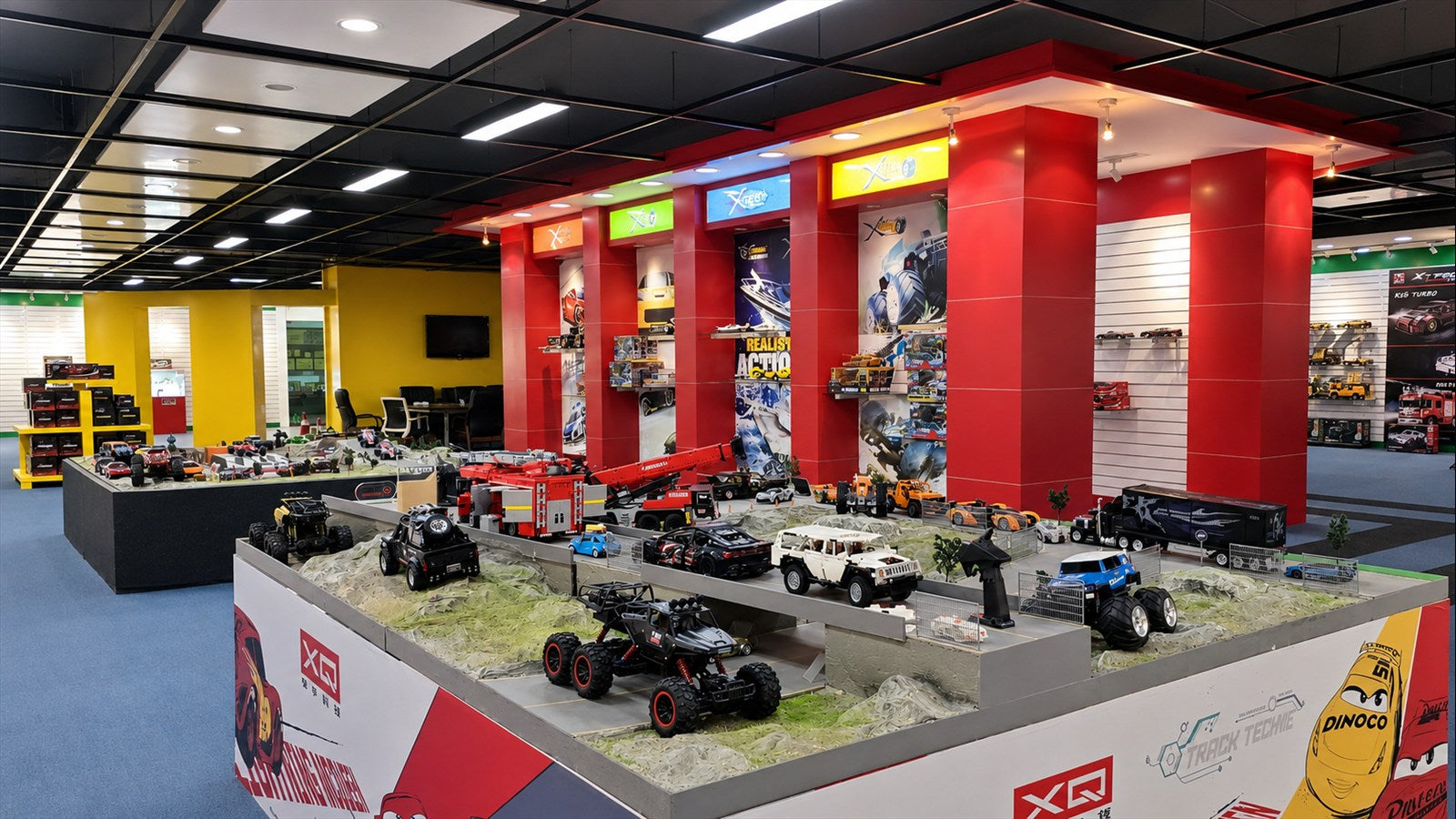 Brand showroom featuring remote-control vehicles, construction vehicles, and scale models
