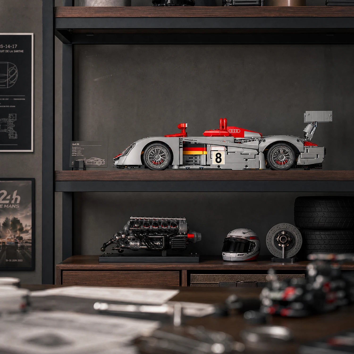 Silver-and-red brick-built endurance race car on display